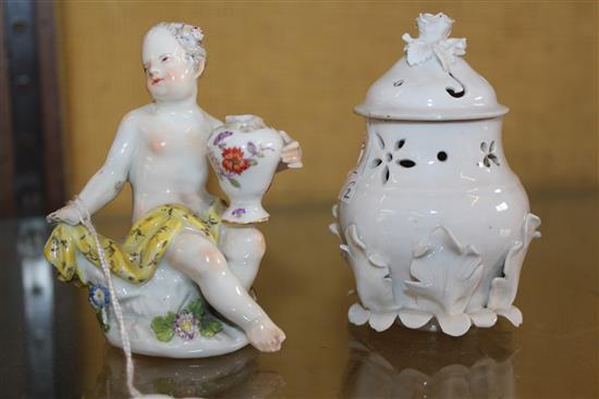 An 18th century Meissen figure of a cherub and a Mennecy vase and cover